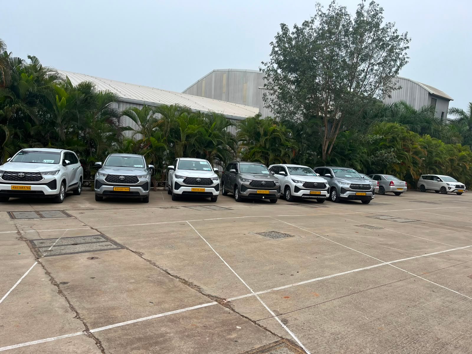 Innova fleet at Velu Tour and Travel Services garage